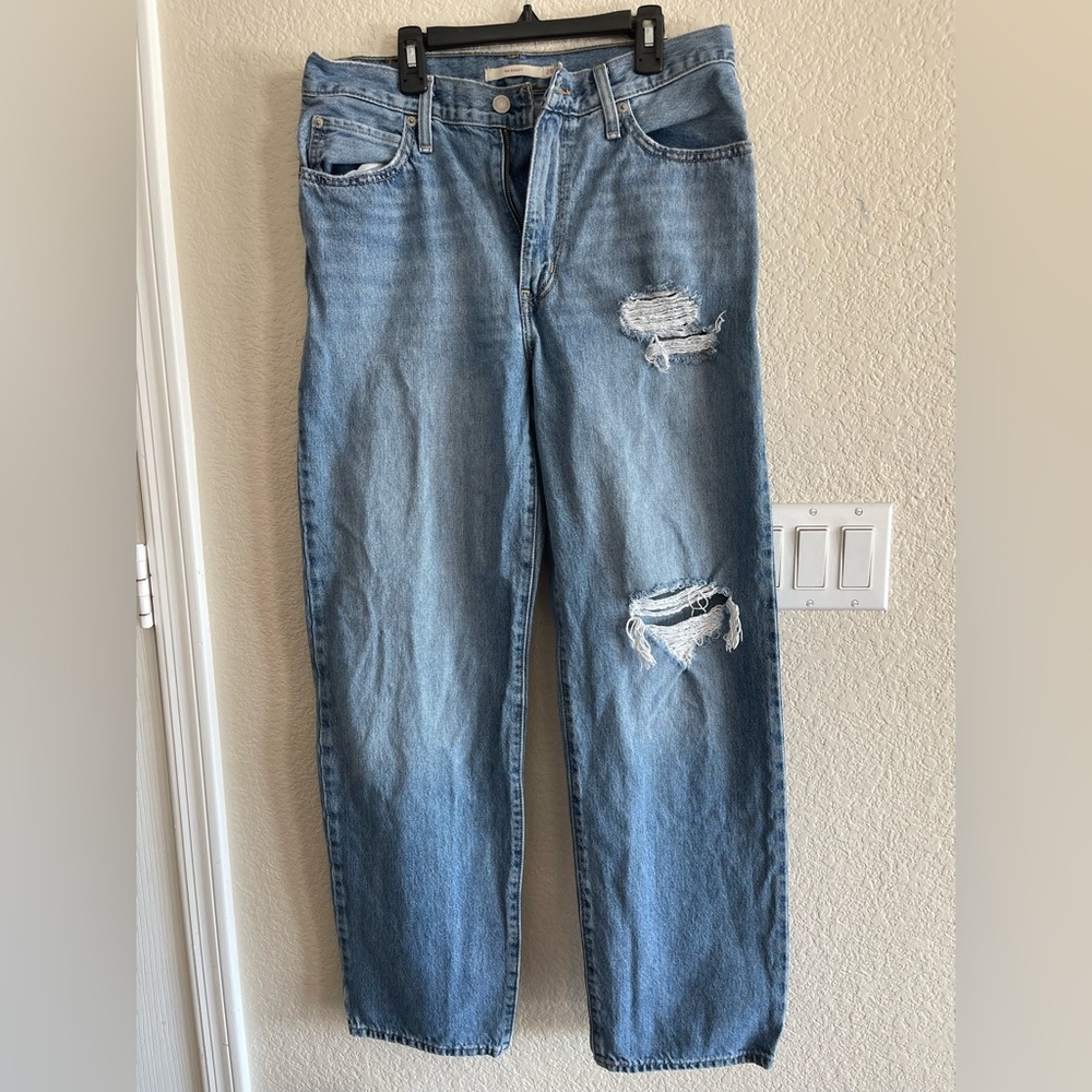 Levi's Light Blue Relaxed Jeans with Distressed Details
